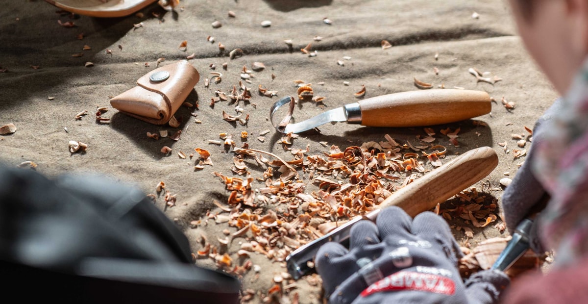 Carving a spoon from green wood with a knife