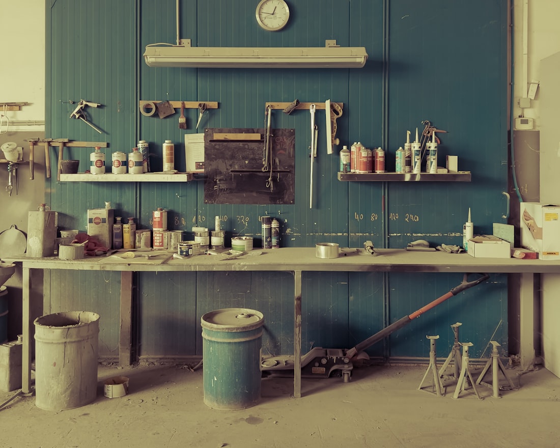The workbench wall with tools and jars