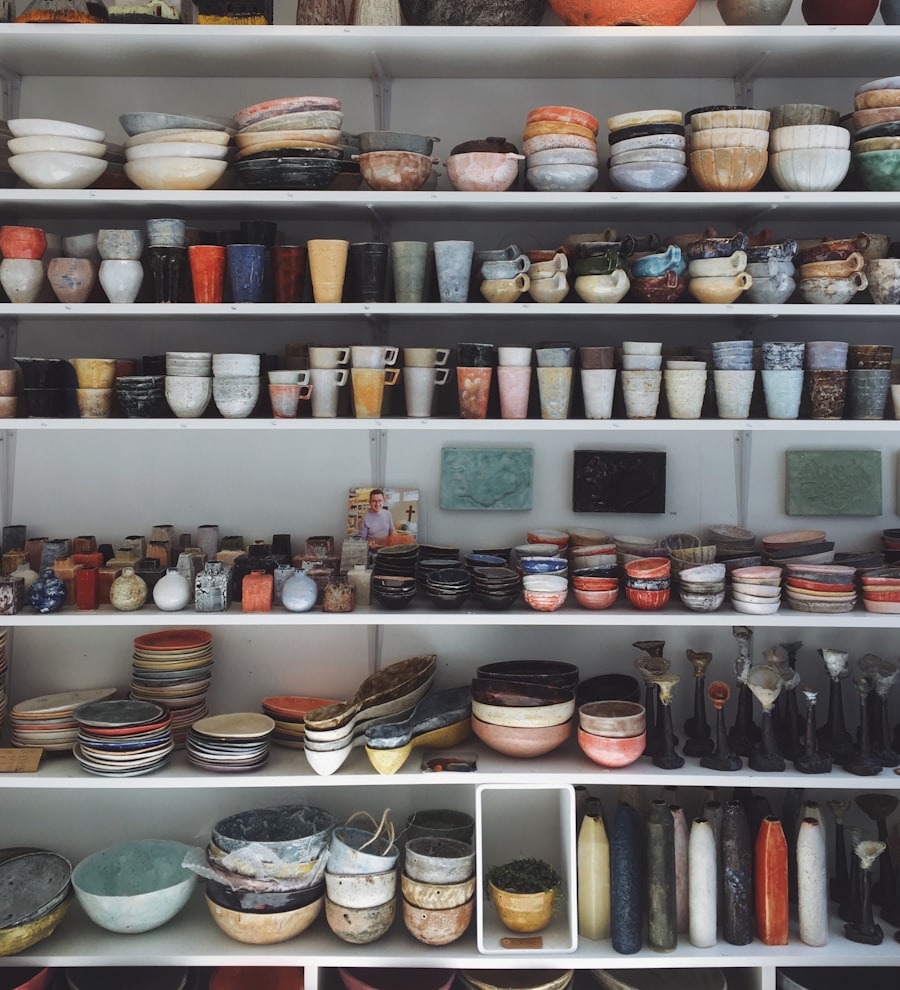 A finished set of handmade mugs on the studio shelf