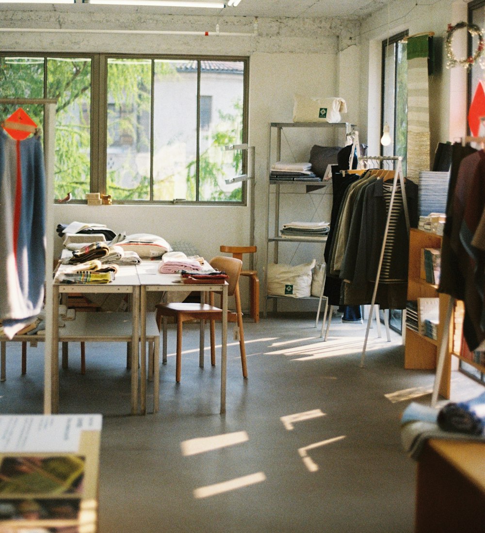 The studio room with the long table and big windows